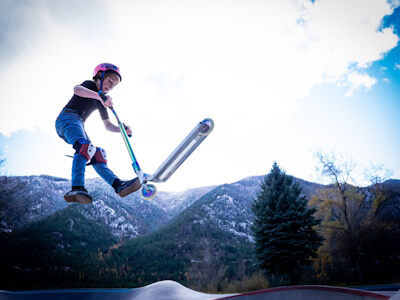 Skateboarder flies through the sky at the Alberton Skate Park MT